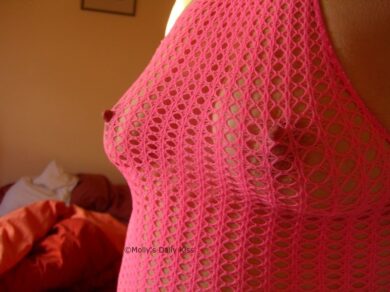 Fishnet body stocking with nipples poking out