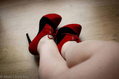 New red and black lace up heels