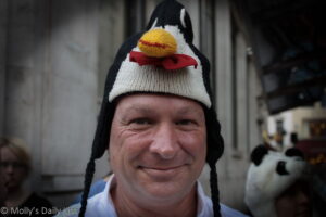 Man wearing penguin hat