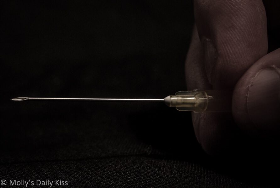Macro shot of needle prick