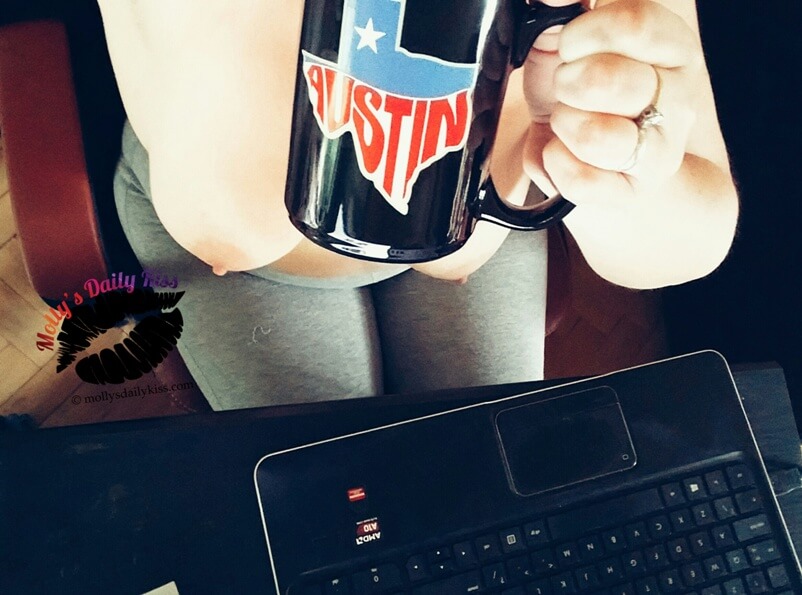 Molly topless drinking tea in Austin mug
