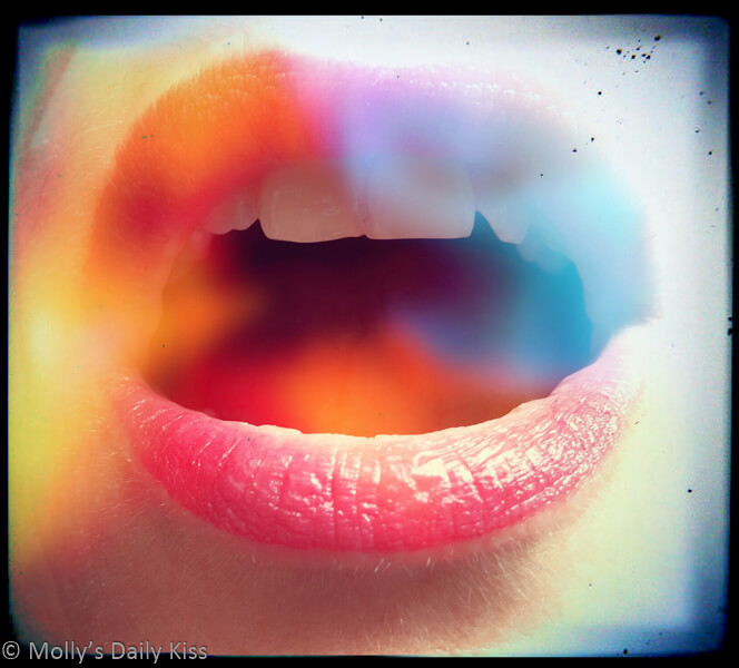 Molly's lips with breathe in colours coming out