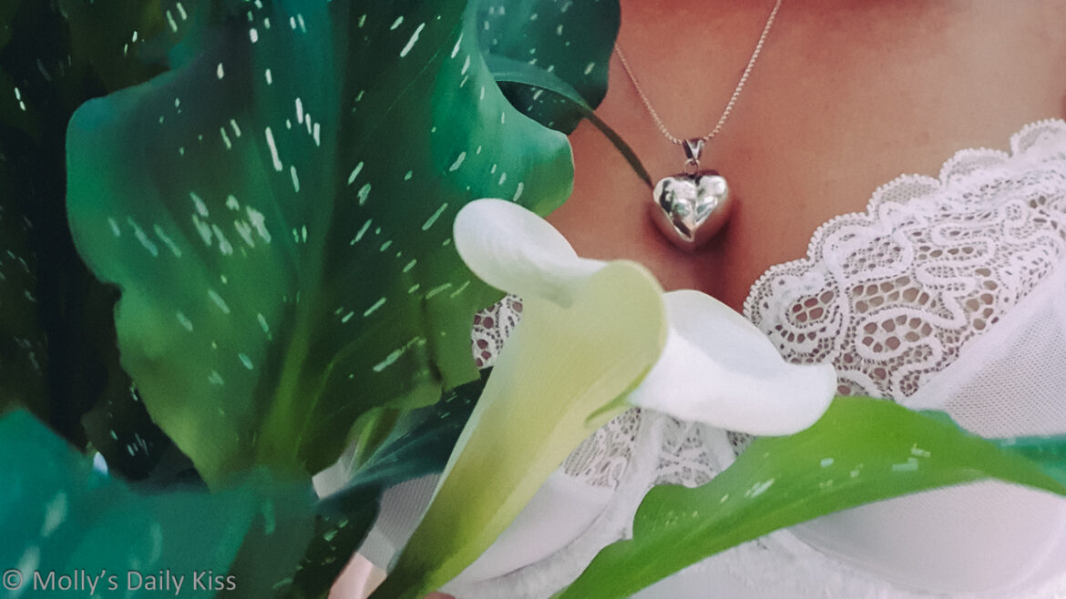 whiteflowerbra White cala lilly against Molly wearing white bra and heart shaped locket