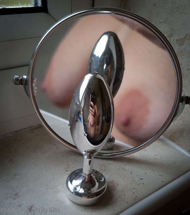 Molly reflected in Doxy butt plug and also in small mirror